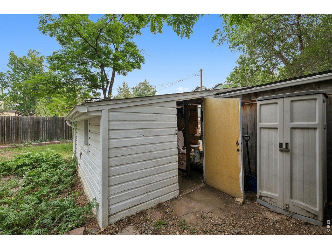 724 Mead Street Louisville, CO 80027 - Photo 21 of 38 Shed and space for garage in the background, alley access