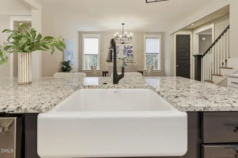 a bathroom with a double vanity sink mirror and double