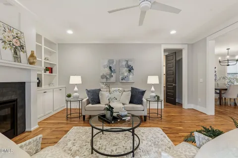 an empty room with a empty space and a ceiling fan