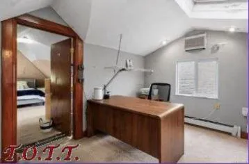 a kitchen with a refrigerator and a sink