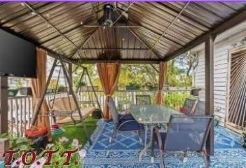 a table and chairs in the patio