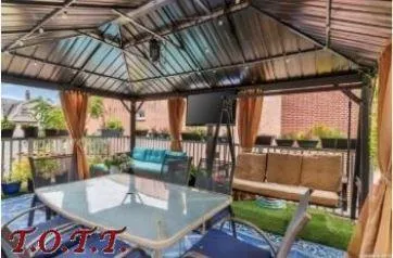 a outdoor dining space with furniture