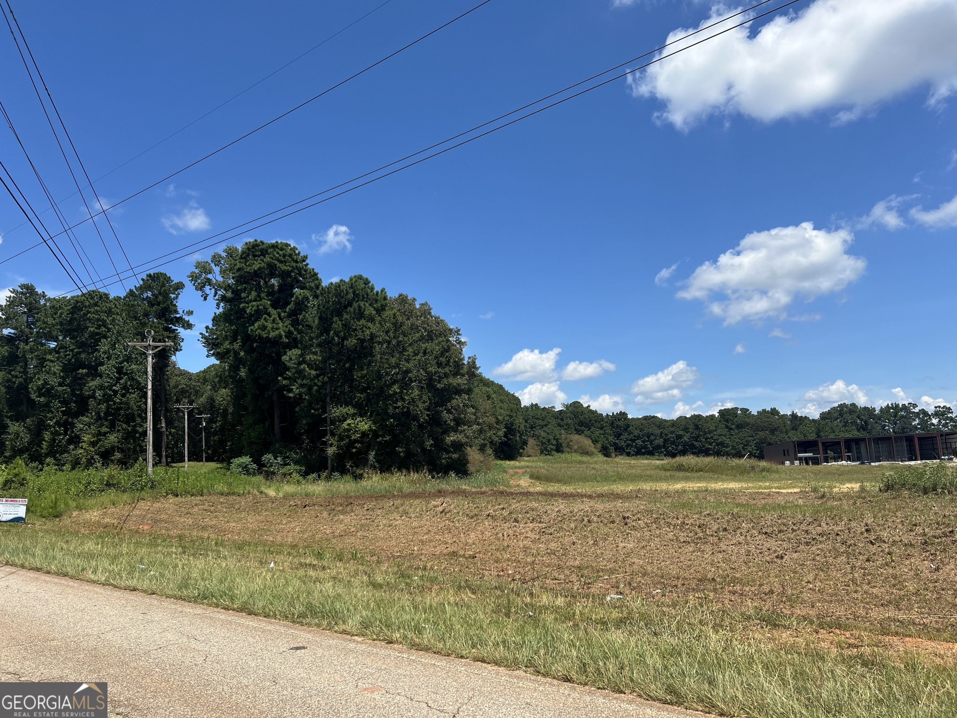 0 Benson Ham Road, Unit OUTPARCEL 1 Forsyth, GA 31029 - Photo 4 of 4 a view of a lake