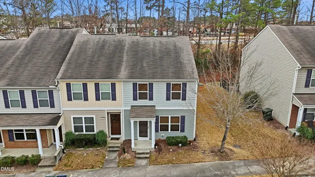 a aerial view of a house with backyard