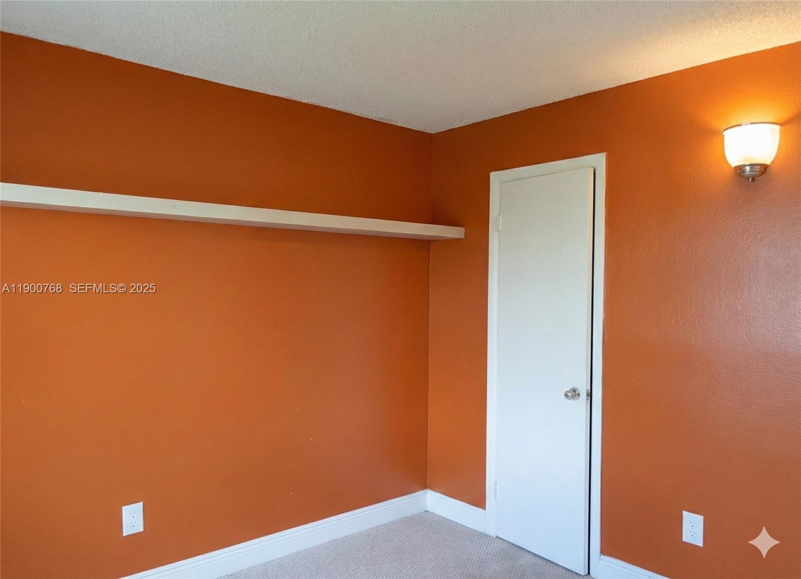 494 Northwest 165th Street, Unit C602 Miami, FL 33169 - Photo 9 of 12 a view of closet