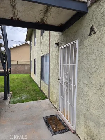 a view of a door with a backyard