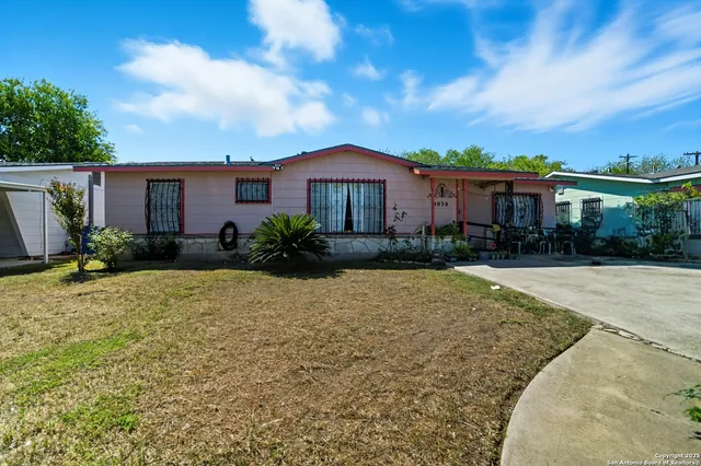 a house view with a garden space