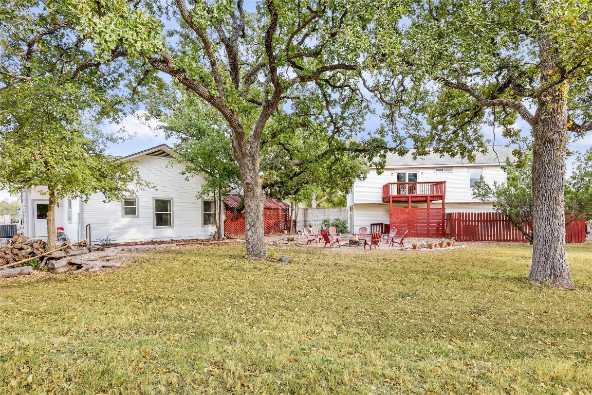 107 Patricia Road Georgetown, TX 78628 - Photo 19 of 34 Big Main House; Backyard. Second Smaller House Yard Area to the Right.
