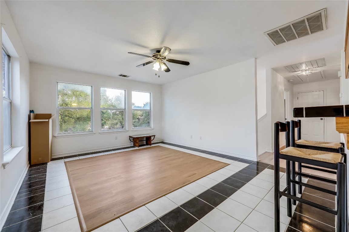 107 Patricia Road Georgetown, TX 78628 - Photo 23 of 34 Second Smaller House: Lots of Light for Upstairs Living Room Off of Kitchen.