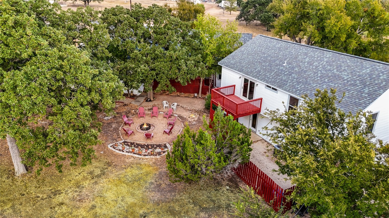 107 Patricia Road Georgetown, TX 78628 - Photo 30 of 34 Backyard of Second Smaller House With Firepit in Between Main Big House.
