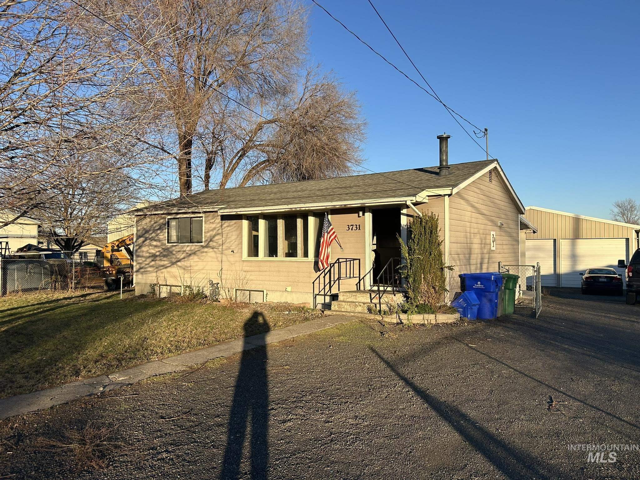 3731 16th Street Lewiston, ID 83501 - Photo 2 of 35 Ranch-style home with roof with shingles and a garage