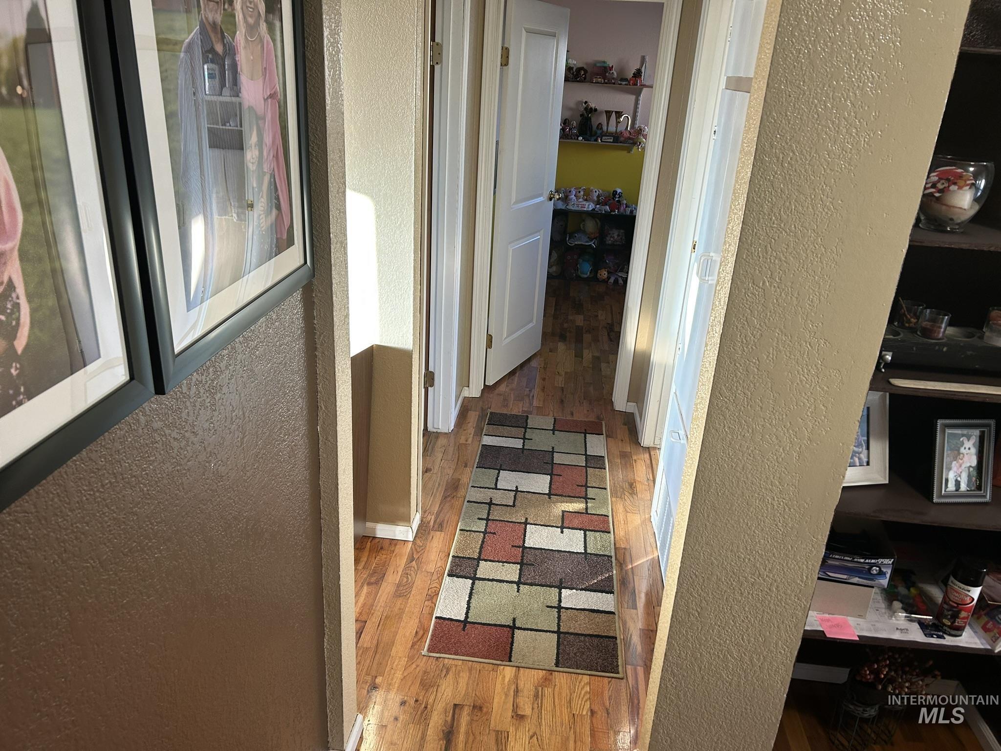 3731 16th Street Lewiston, ID 83501 - Photo 10 of 35 Hallway with a textured wall and light wood-style floors