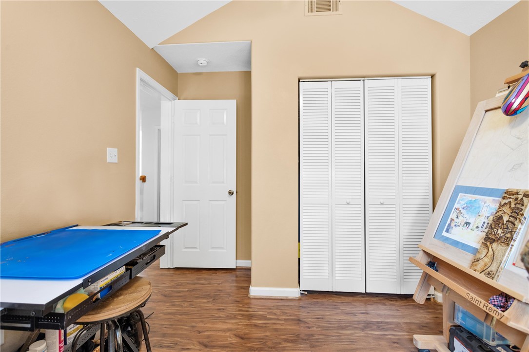 30820 Collier Smith Road Magnolia, TX 77354 - Photo 25 of 50 a view of room with furniture and wooden floor