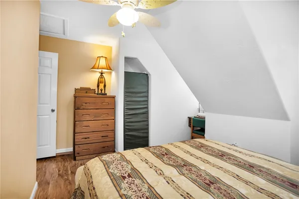 a view of a hallway with stairs