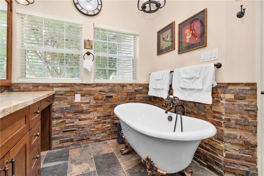 30820 Collier Smith Road Magnolia, TX 77354 - Photo 37 of 50 a bathroom with a sink and a mirror