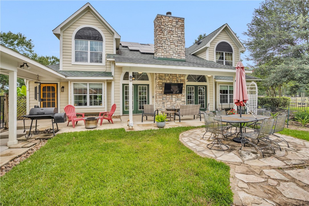 30820 Collier Smith Road Magnolia, TX 77354 - Photo 45 of 50 a front view of a house with swimming pool and furniture