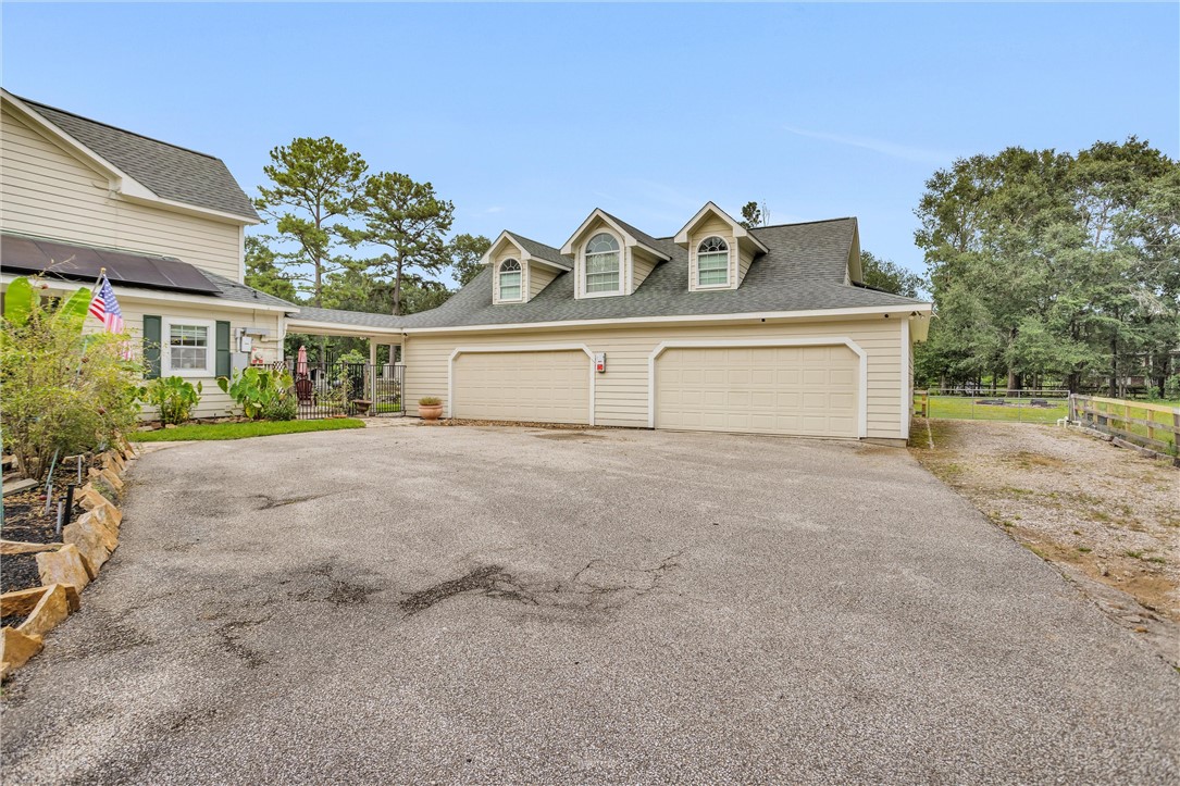 30820 Collier Smith Road Magnolia, TX 77354 - Photo 47 of 50 front view of a house with a street