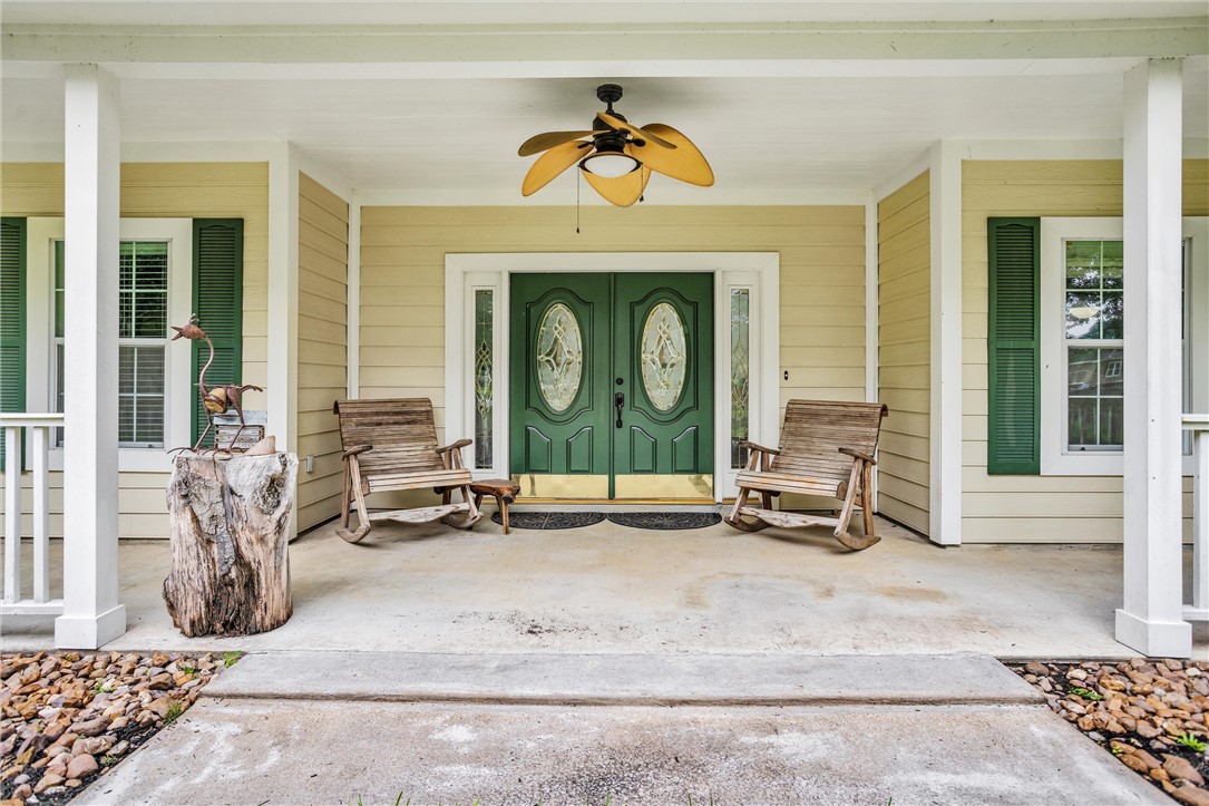 30820 Collier Smith Road Magnolia, TX 77354 - Photo 10 of 50 a view of a entryway with a table and chairs