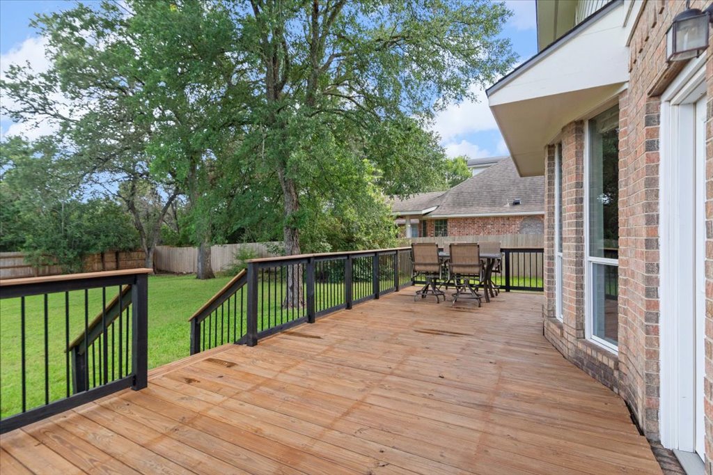 10801 Beachmont Lane Austin, TX 78739 - Photo 32 of 40 Recently re-stained spacious deck perfect for family parties and BBQ's! Backyard faces East so no hot West sun to worry about in the afternoons!