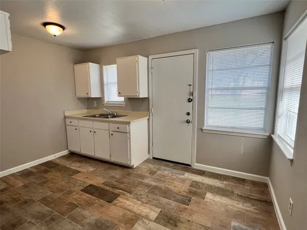 a view of a kitchen with a sink