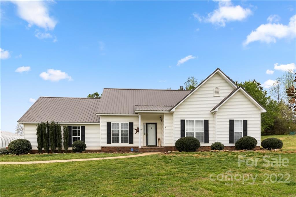 3505 Crow Burk Road Pageland, SC 29728 - Photo 1 of 30 a front view of a house with a yard