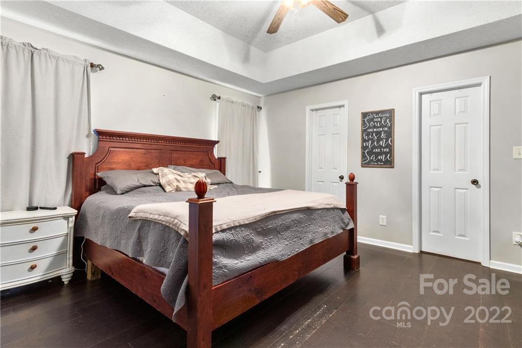 3505 Crow Burk Road Pageland, SC 29728 - Photo 26 of 30 a bed sitting in a bedroom next to a window
