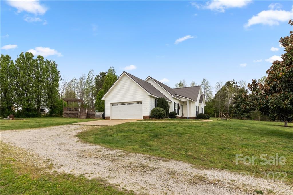 3505 Crow Burk Road Pageland, SC 29728 - Photo 7 of 30 a view of a house with a yard