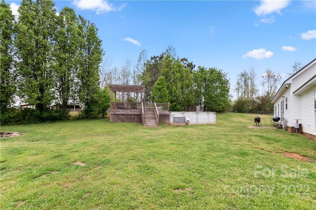 3505 Crow Burk Road Pageland, SC 29728 - Photo 9 of 30 a house view with a garden space