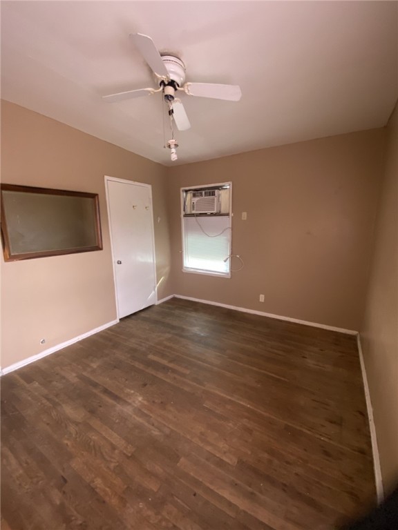 1100 South Cameron Street Alice, TX 78332 - Photo 13 of 18 a view of empty room with wooden floor and fan