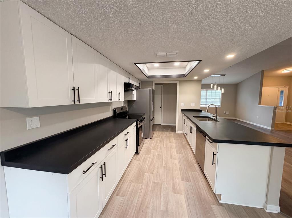 7650 Holiday Drive Spring Hill, FL 34606 - Photo 2 of 29