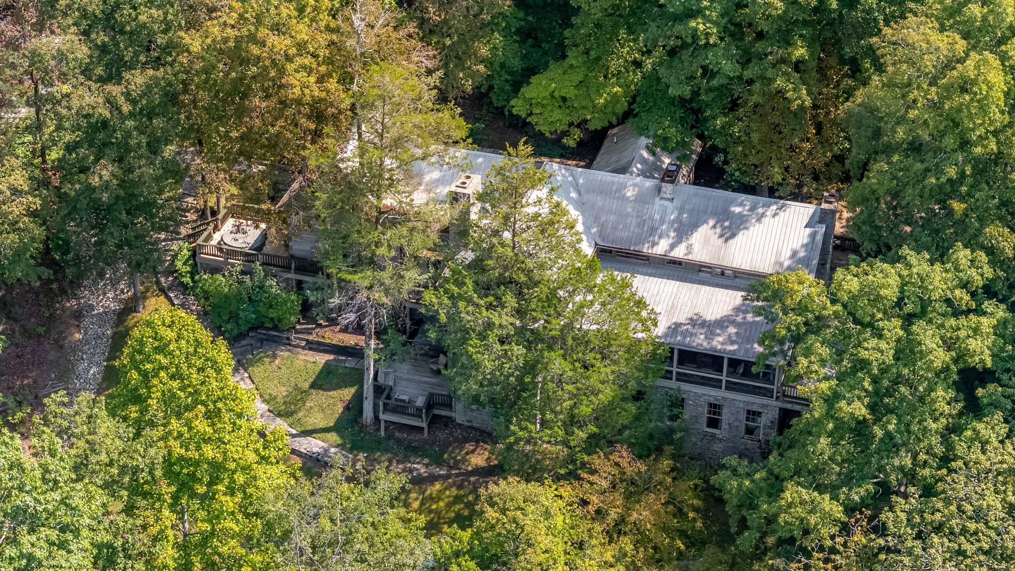 658 Moore Road Doyle, TN 38559 - Photo 54 of 92 an aerial view of a house with a yard basket ball court and outdoor seating