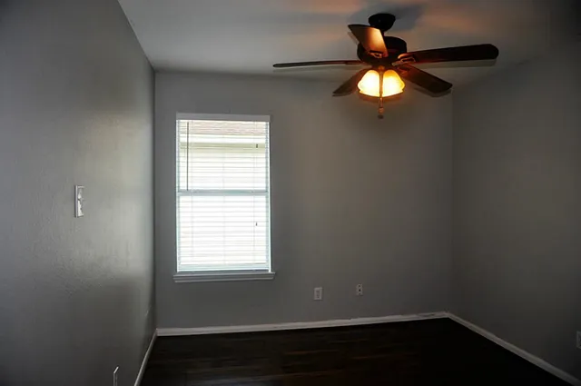 a bathroom with a sink and shower