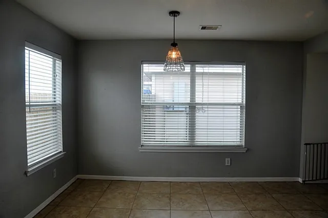 an empty room with a window