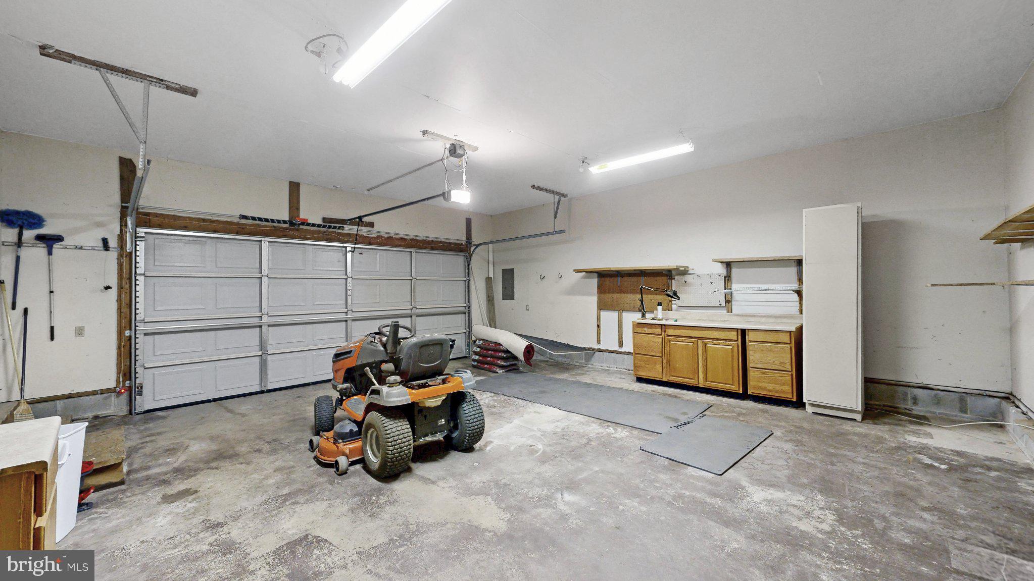 163 Pratts Branch Road Felton, DE 19943 - Photo 53 of 55 Spacious garage with ample storage.