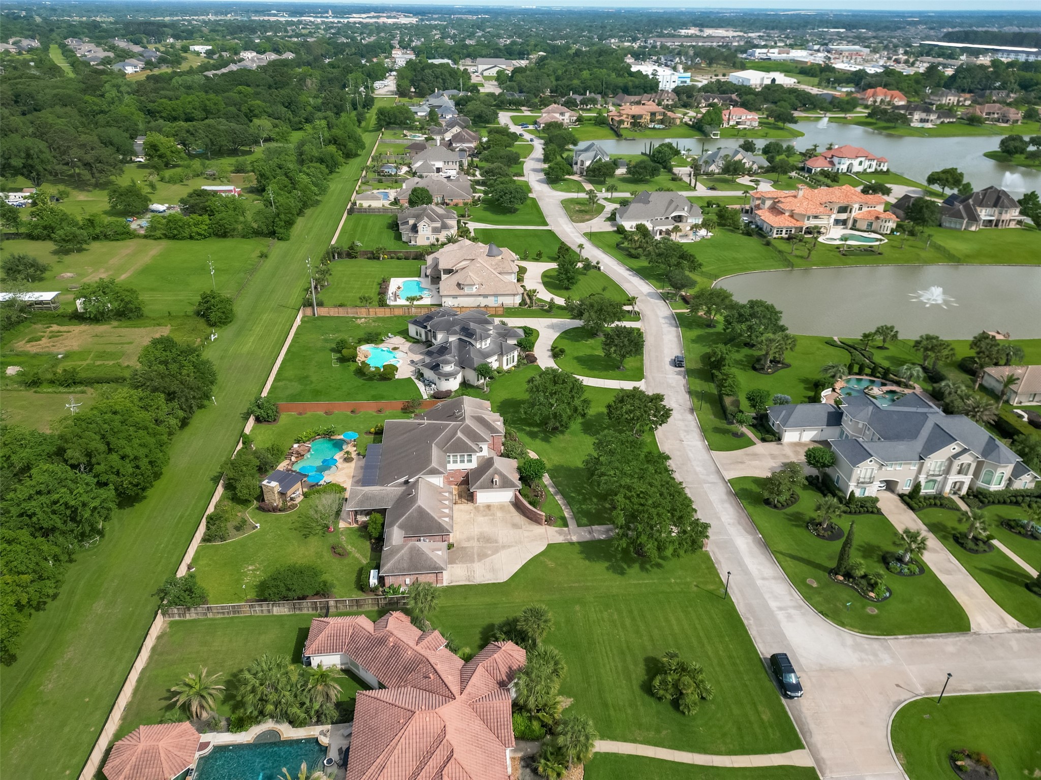 2319 Braer Ridge Drive Katy, TX 77494 - Photo 44 of 50 an aerial view of city lake and houses with outdoor space