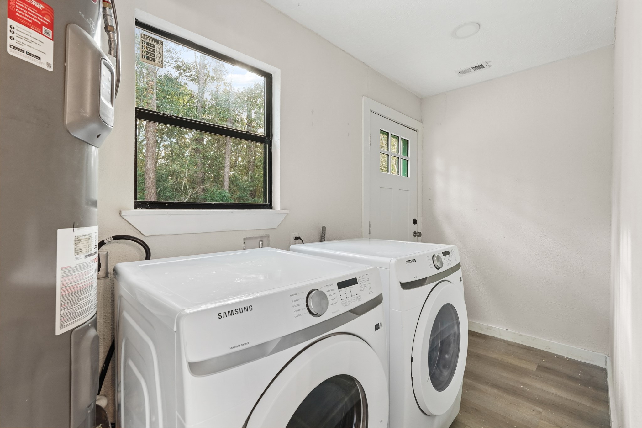 24006 Crooked Creek Road Hockley, TX 77447 - Photo 21 of 25 a utility room with dryer and washer