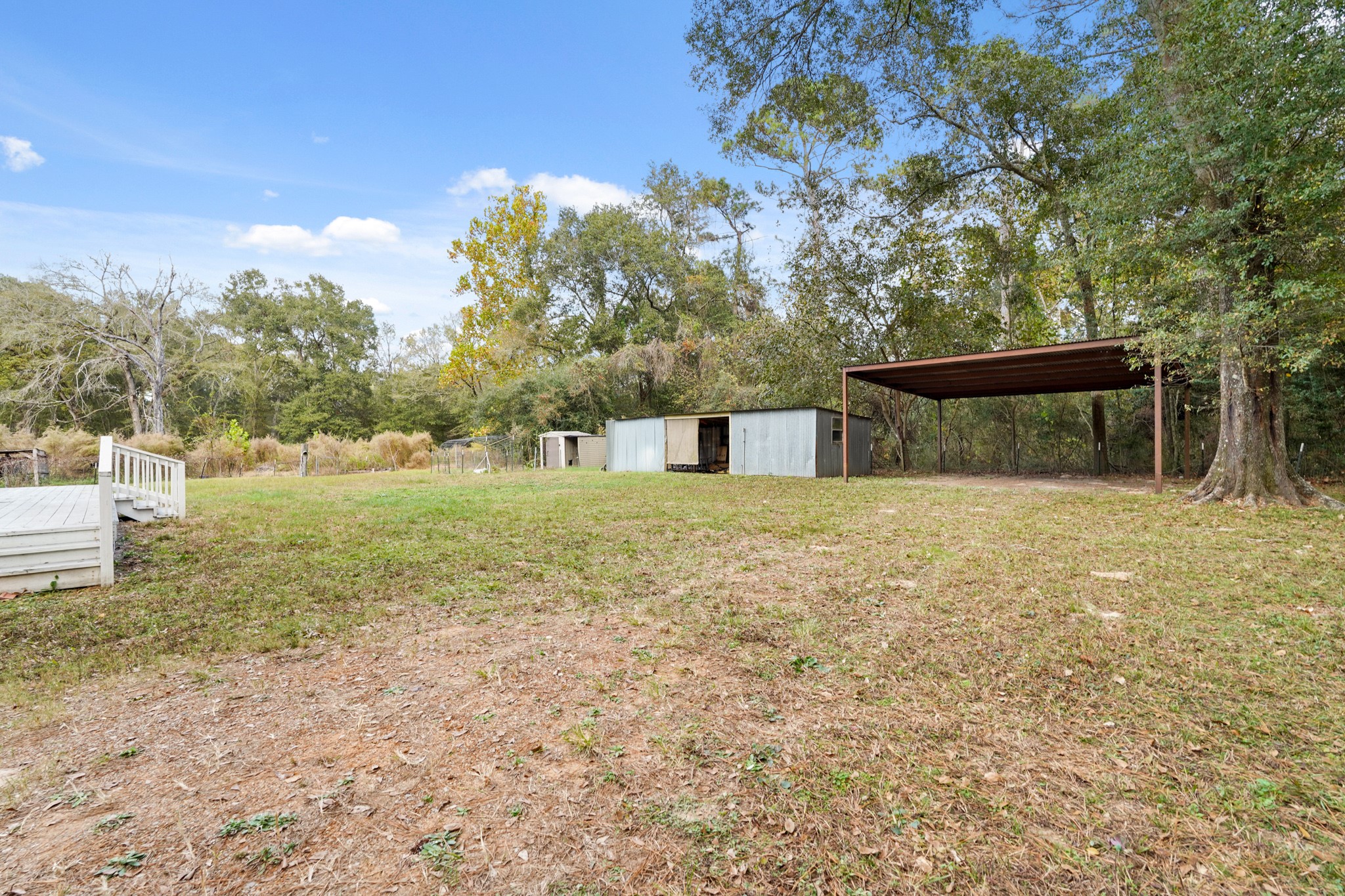24006 Crooked Creek Road Hockley, TX 77447 - Photo 22 of 25 a backyard of a house with lots of green space