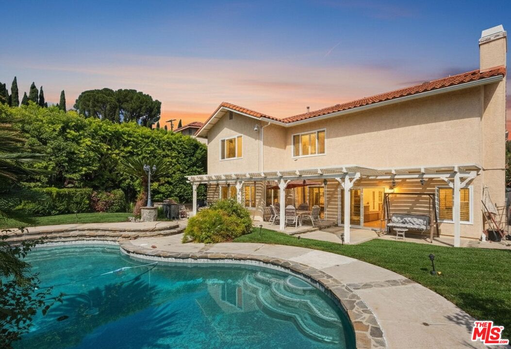 a house view with a garden space