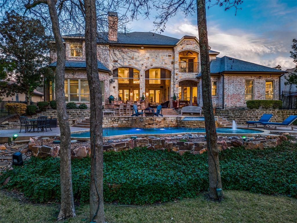 a front view of building with yard