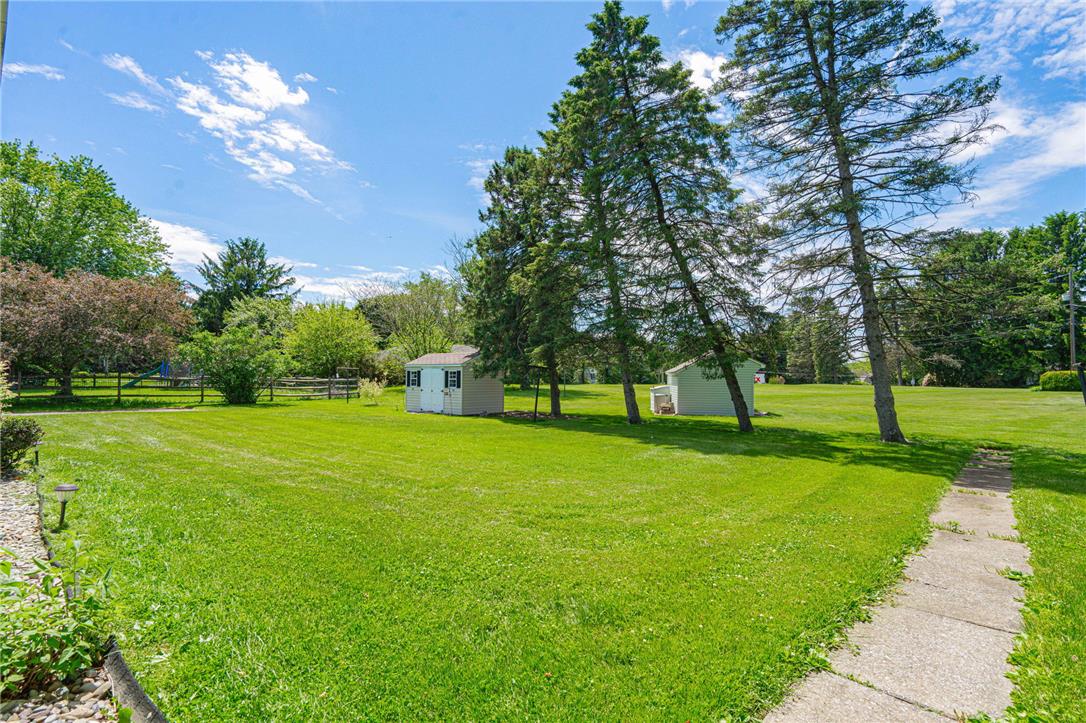 579 Cherry Road Northampton, PA 18067 - Photo 49 of 57 A spacious, verdant yard with mature trees offers ample room for outdoor activities.