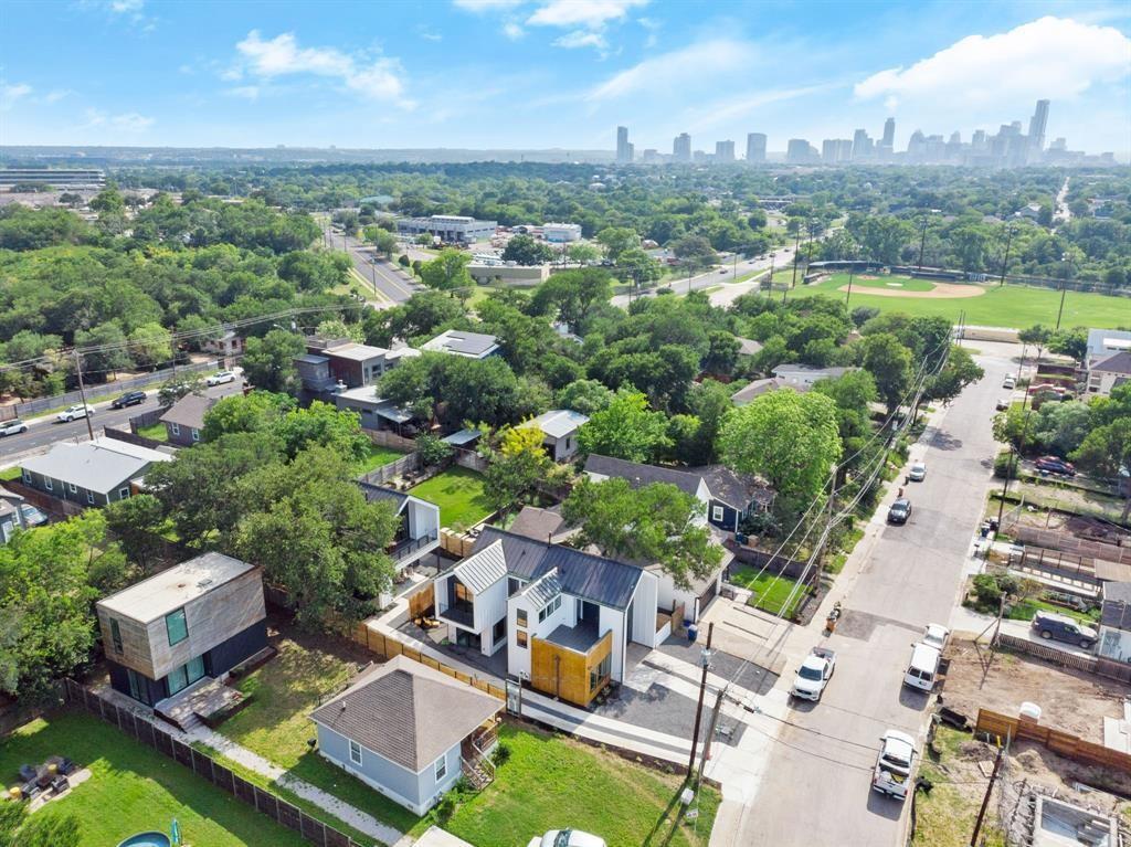 2919 East 13th Street, Unit 2 Austin, TX 78702 - Photo 20 of 20 an aerial view of residential houses with outdoor space and river