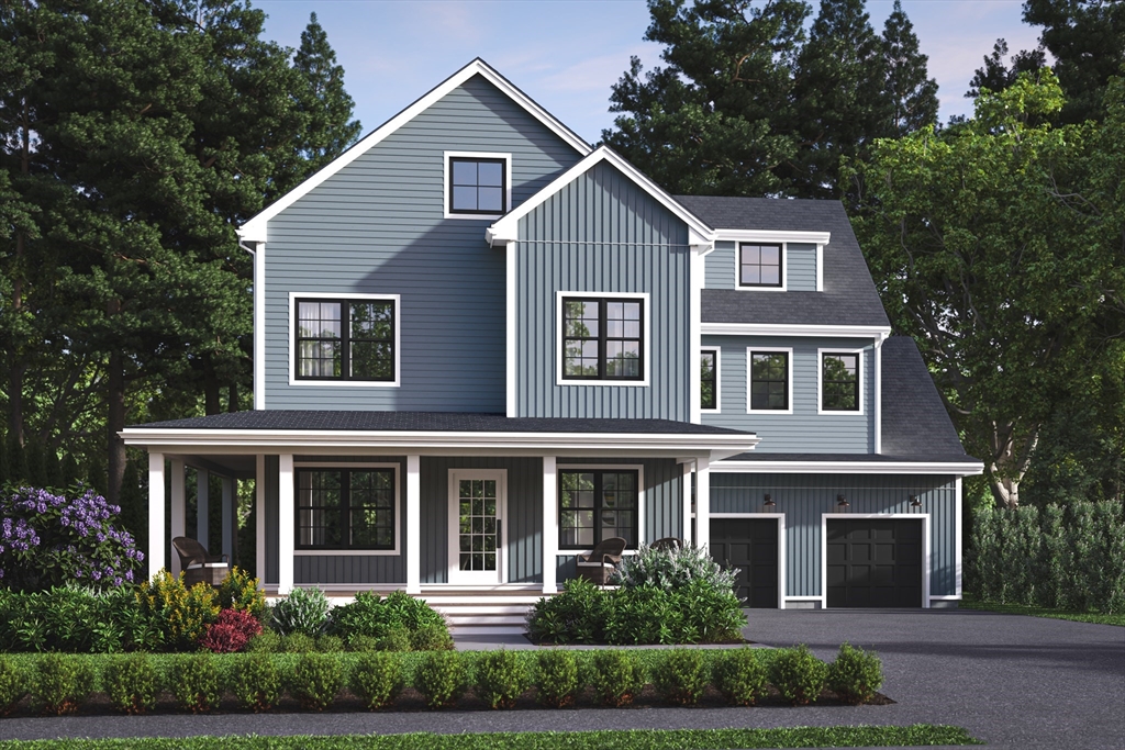a front view of a house with a yard and green space