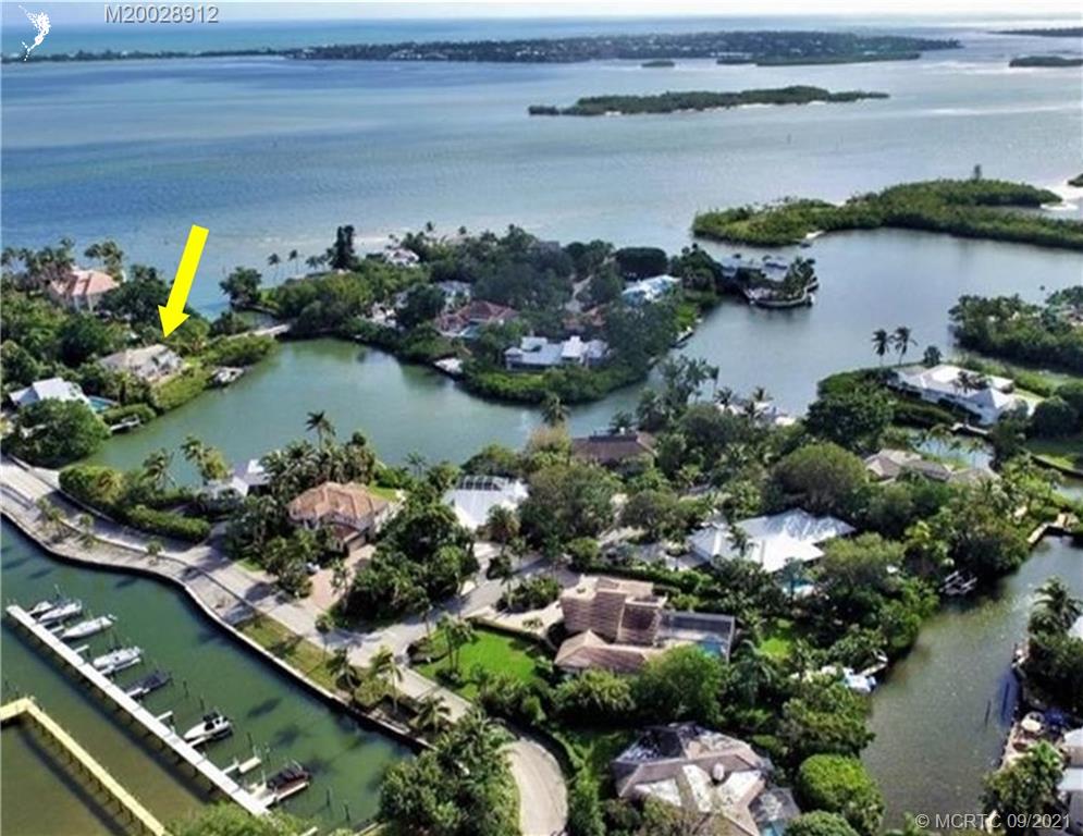 13 Simara Street Stuart, FL 34996 - Photo 33 of 37 a view of a lake with a lake