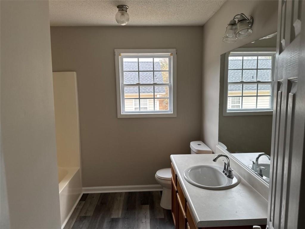 380 River Trace Drive Villa Rica, GA 30180 - Photo 10 of 12 a bathroom with a sink and a toilet