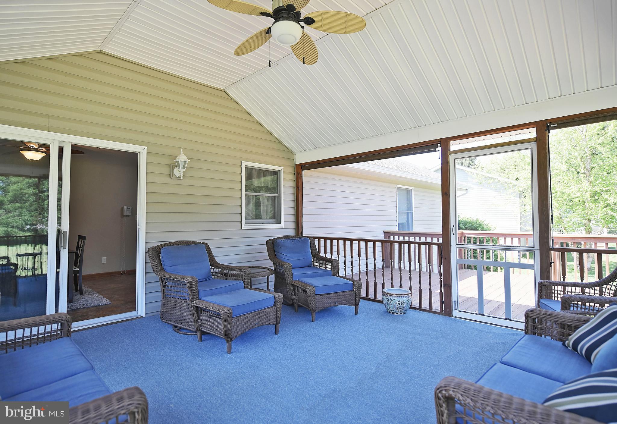 1451 Oldfield Point Road Elkton, MD 21921 - Photo 12 of 51 Relax on the amazing screened porch