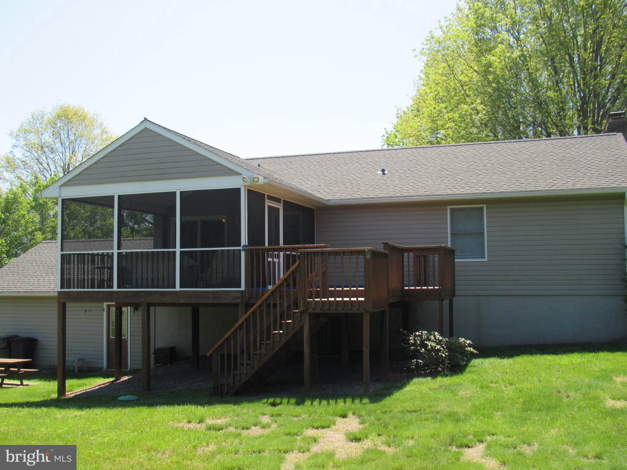 1451 Oldfield Point Road Elkton, MD 21921 - Photo 16 of 51 Screened porch & deck