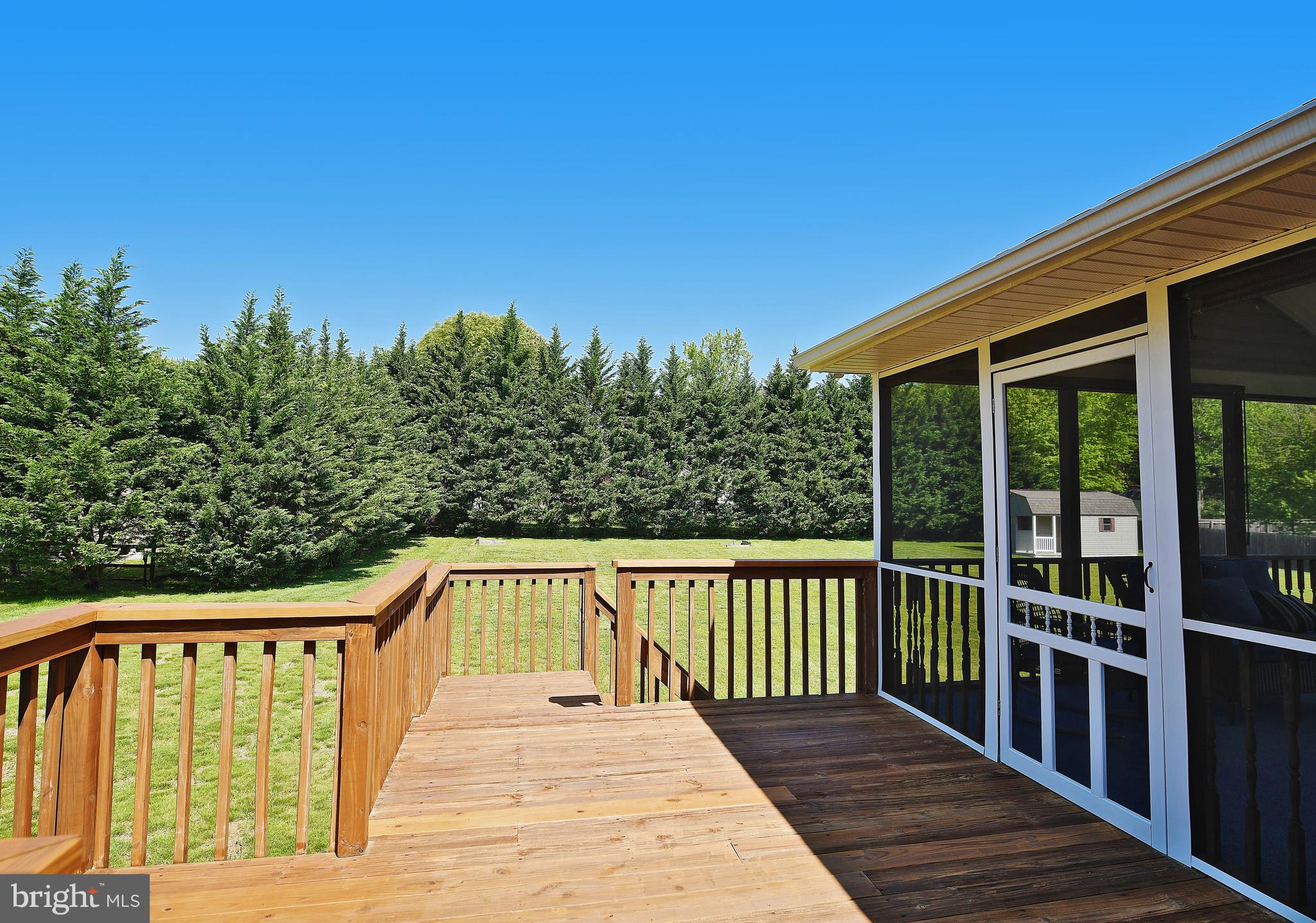 1451 Oldfield Point Road Elkton, MD 21921 - Photo 19 of 51 Deck with stpes to backyard