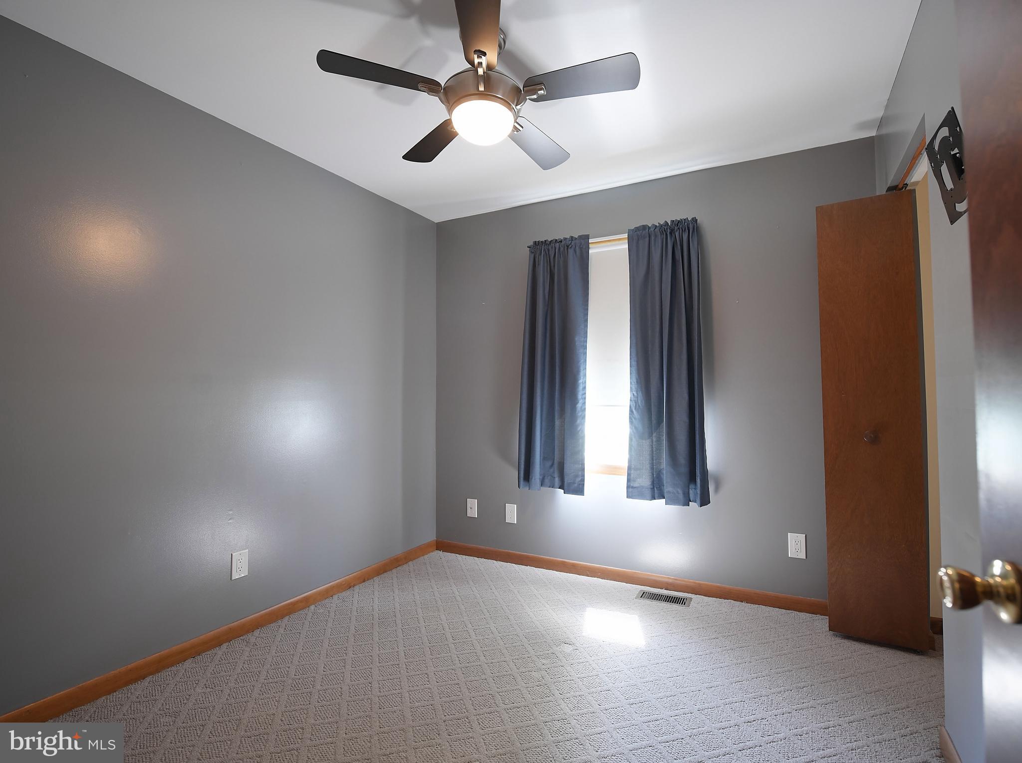 1451 Oldfield Point Road Elkton, MD 21921 - Photo 27 of 51 Bedroom 3 with single door closet & ceiling fan