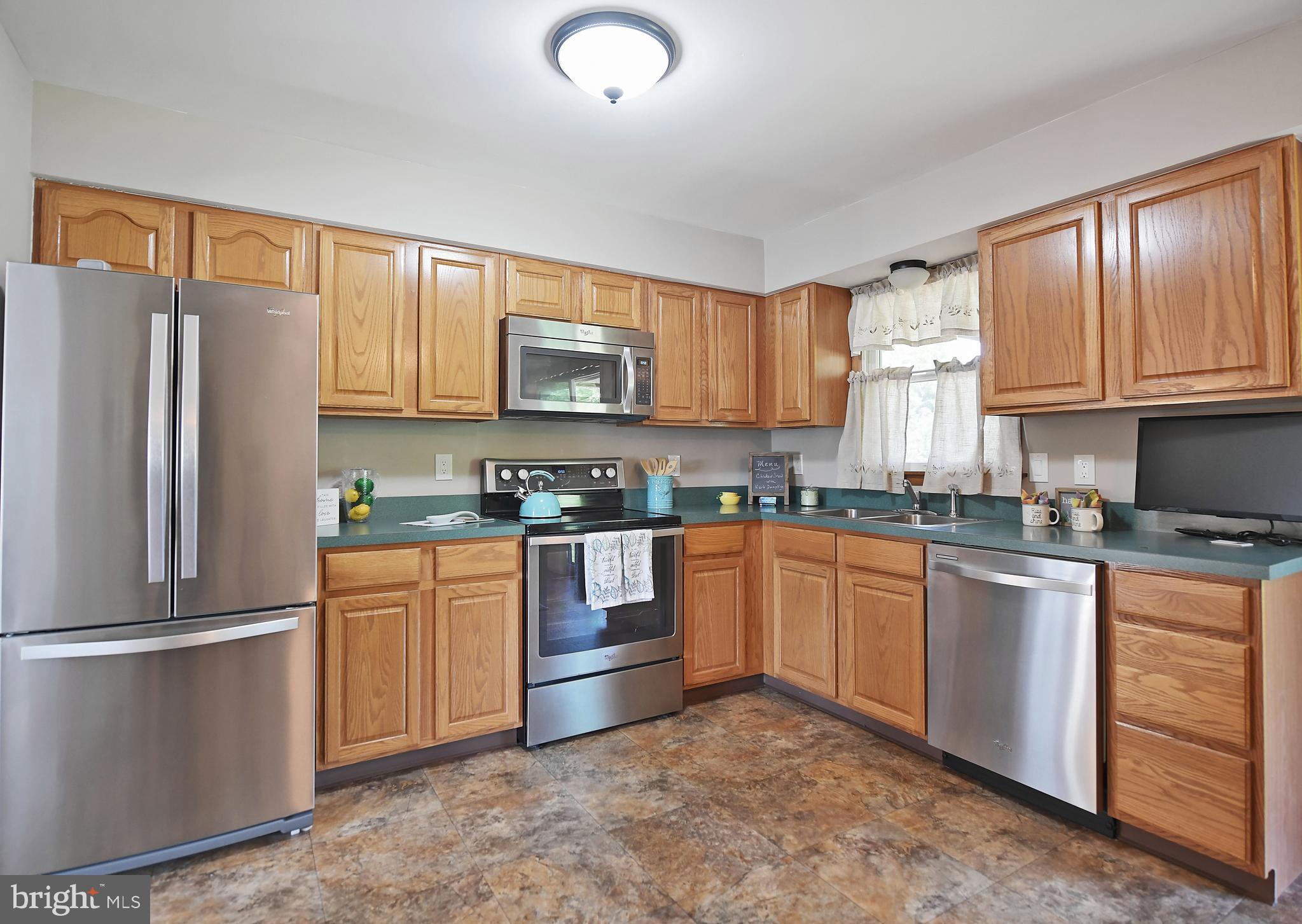 1451 Oldfield Point Road Elkton, MD 21921 - Photo 7 of 51 Kitchen with stainless steel appliances