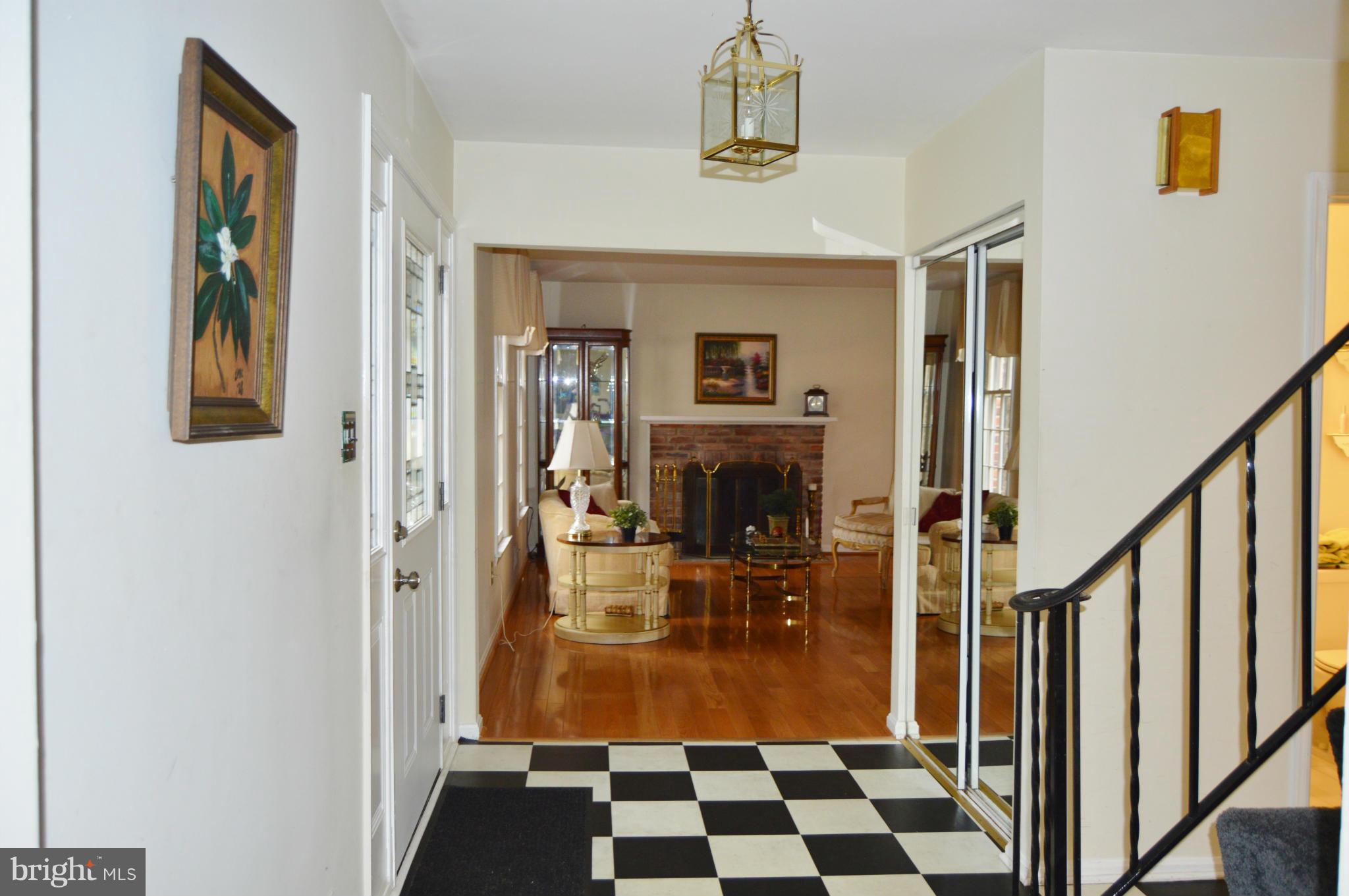 2017 Hopefield Road Silver Spring, MD 20905 - Photo 2 of 30 a view of living room with a flat screen tv and a fireplace